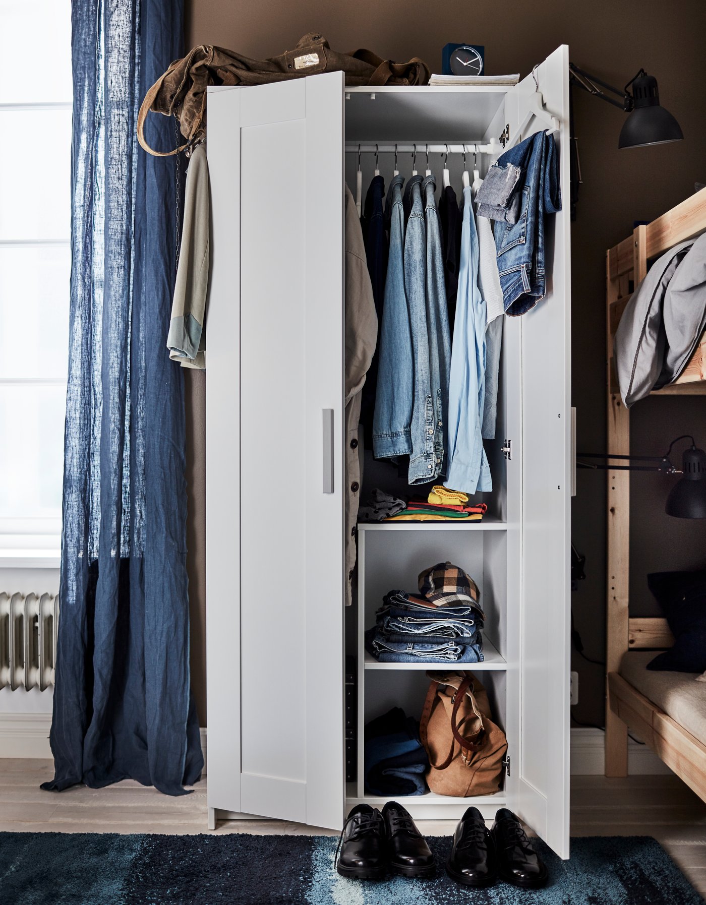 A white BRIMNES wardrobe with 2 doors in the bedroom