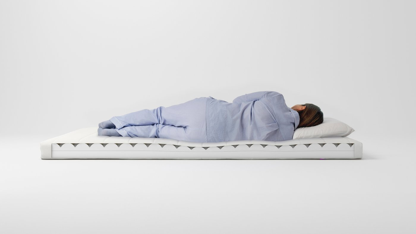 Un matelas en mousse ÅFJÄLL ferme/blanc