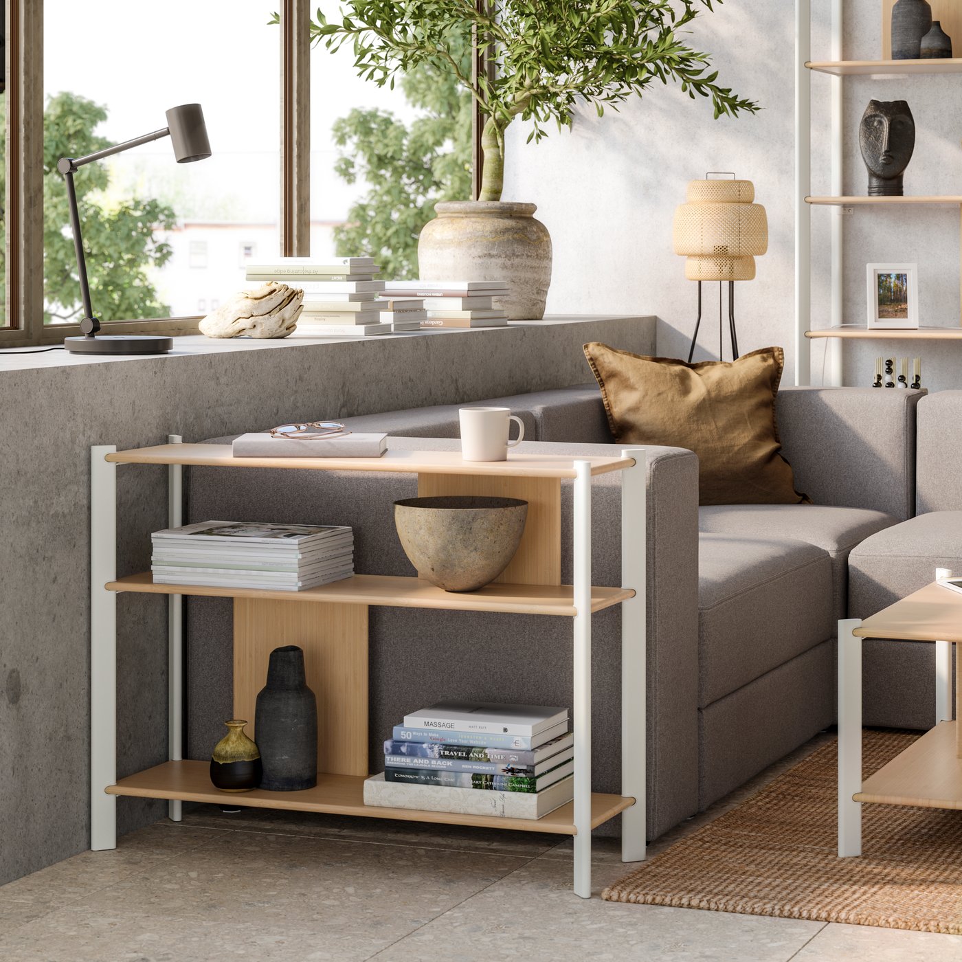 A white/light bamboo JÄTTESTA side table in the living room
