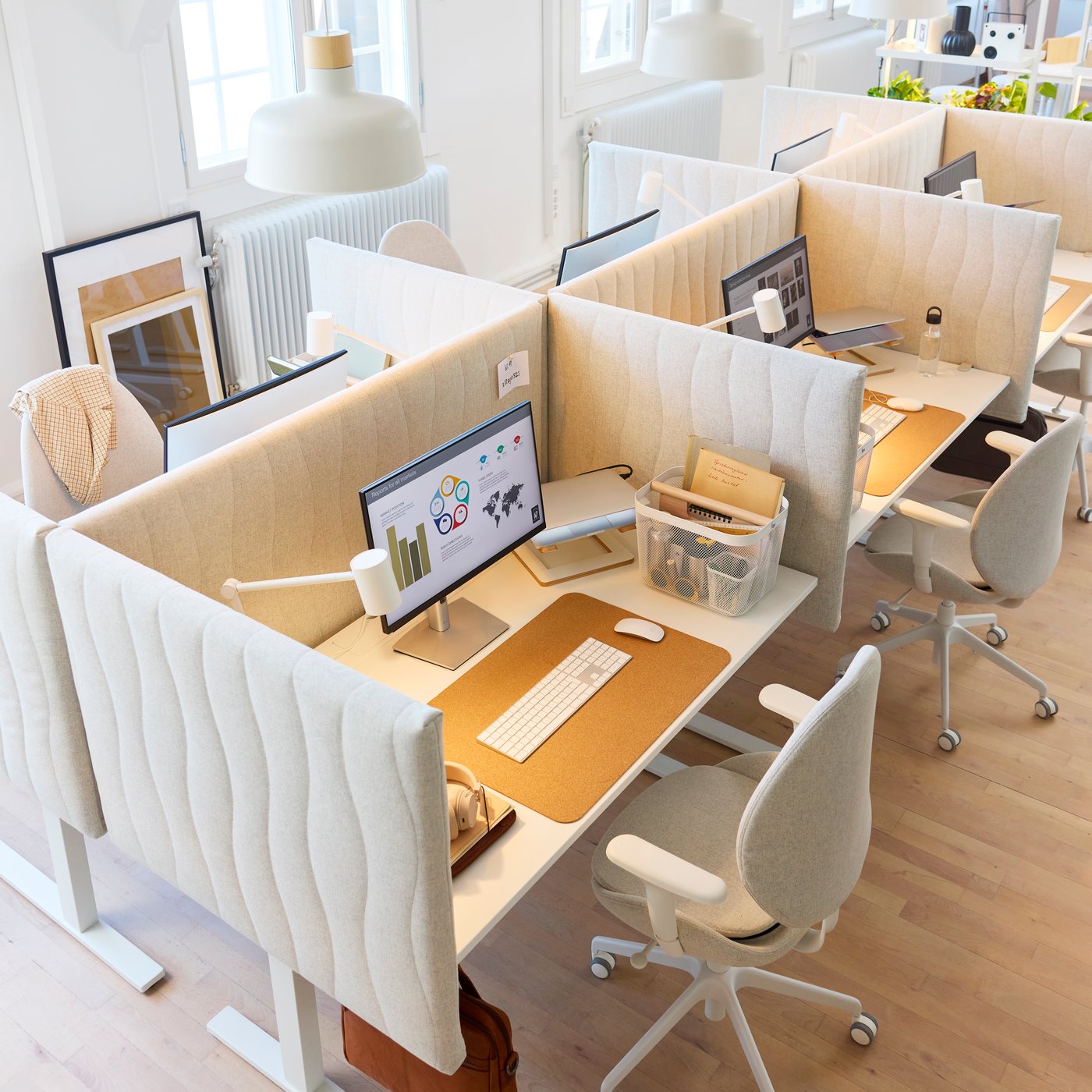An electric white MITTZON desk sit/stand