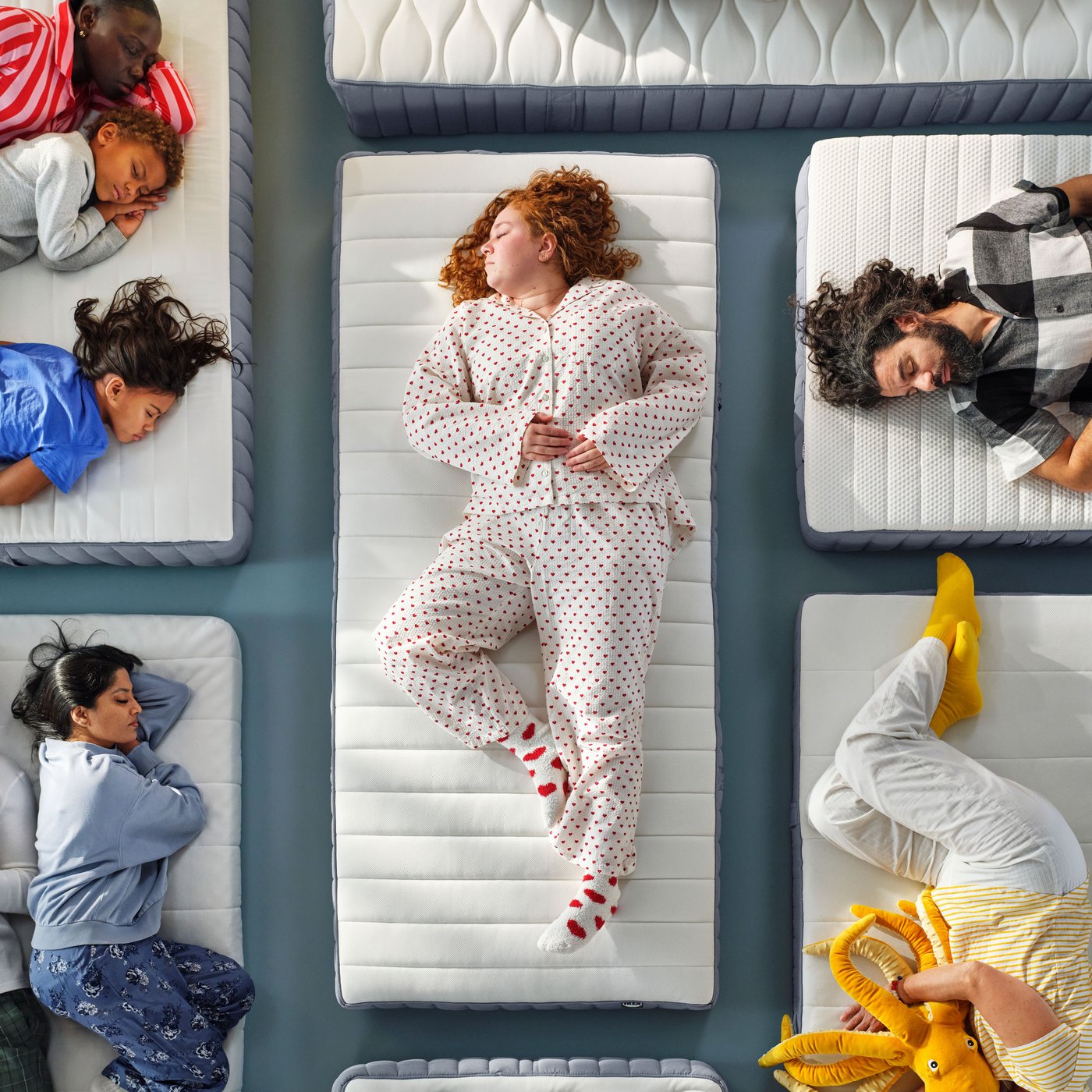 A firm/light blue VALEVÅG pocket sprung mattress in the NA