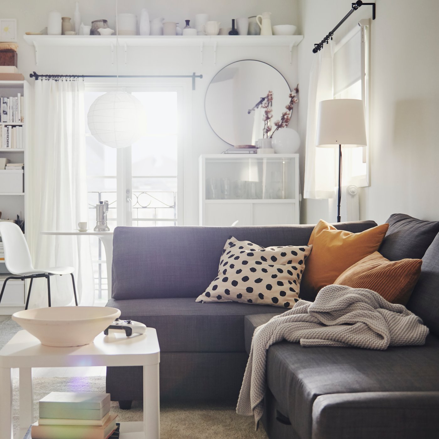 An off-white/dot pattern black ODDNY cushion cover