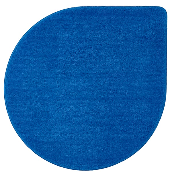 A blue BERGVATTNET bath mat