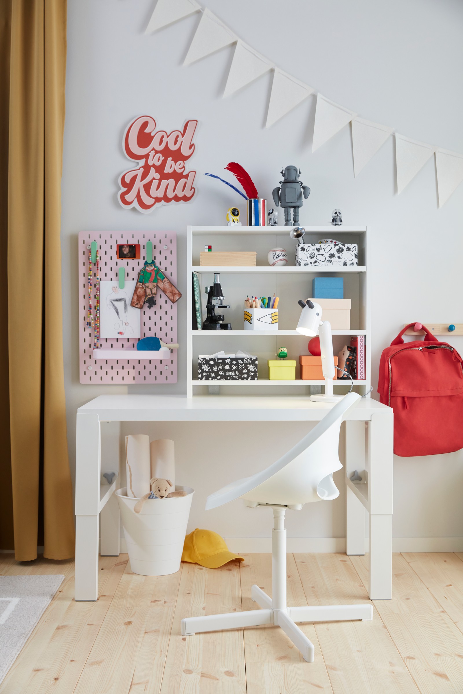 A white PÅHL desk in the childrens room