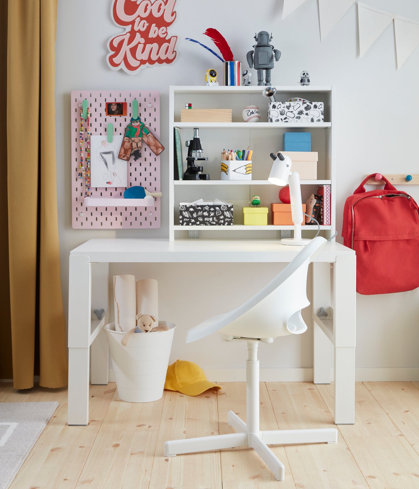 A white PÅHL desk in the childrens room