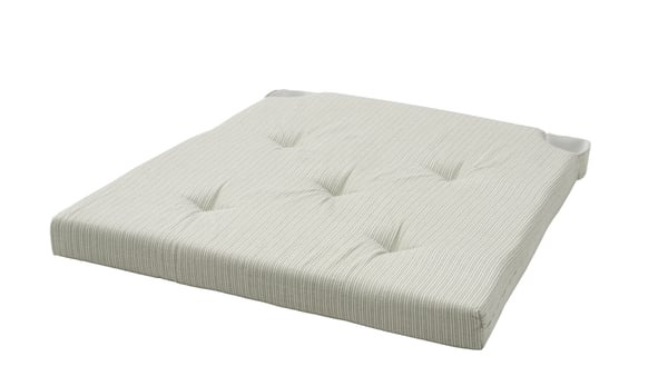 A light green JUSTINA chair pad