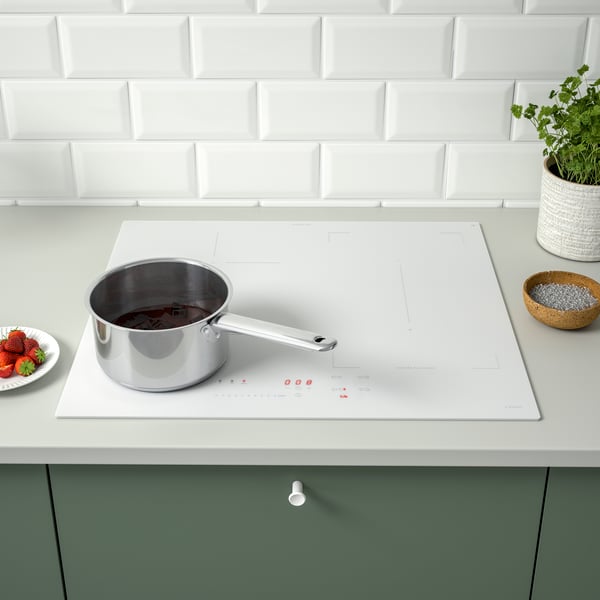 An IKEA 500 white KOLSTAN induction hob