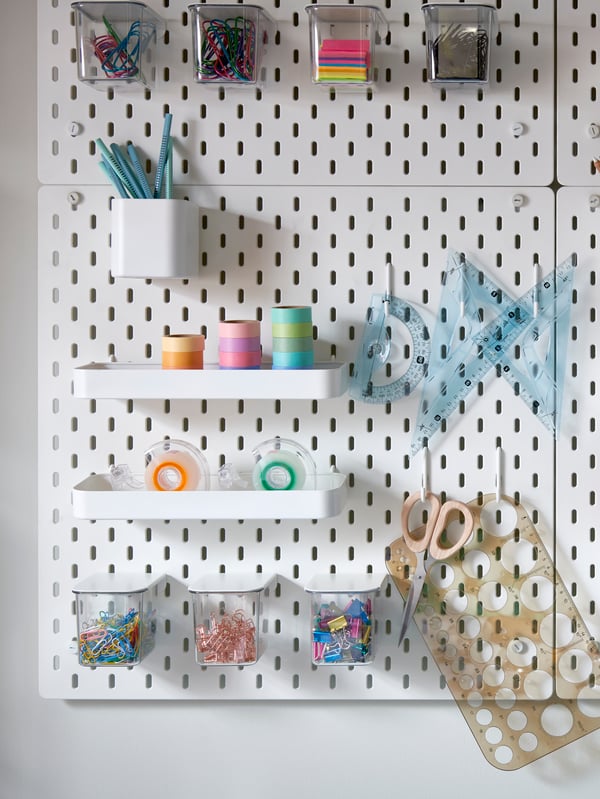 A white SKÅDIS pegboard combination in the home office