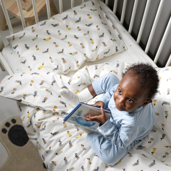 A puppy pattern/multicolour DRÖMSLOTT duvet cover 1 pillowcase for cot