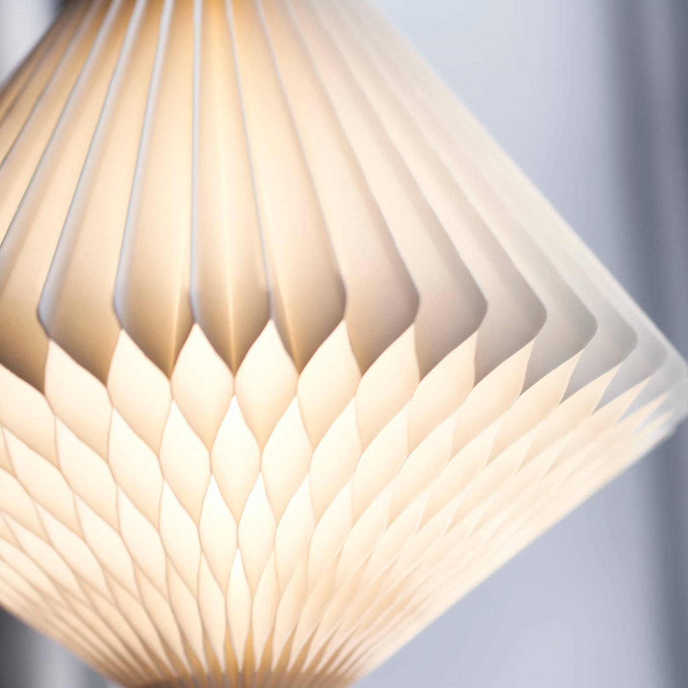 A diamond-shaped white STRÅLA lampshade