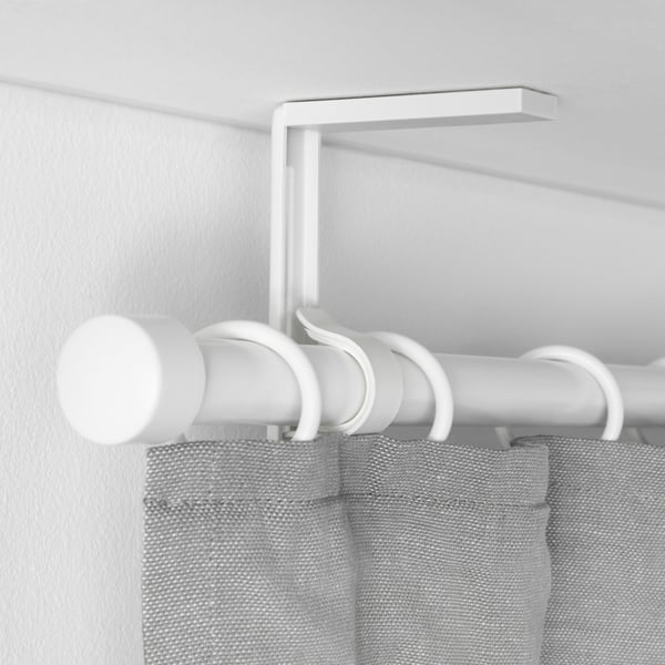 A white BETYDLIG wall/ceiling bracket