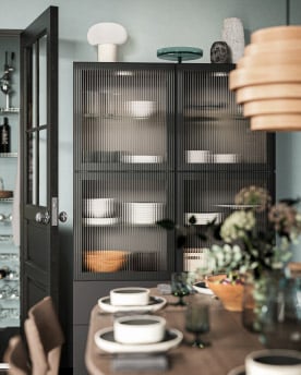 A dark grey OMBONAD bowl