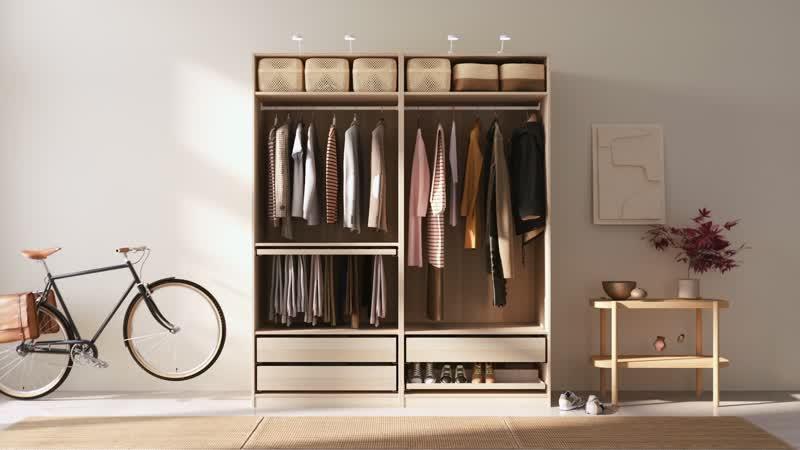 Man sieht eine PAX Kleiderschrank Kombination die sich super schnell aufbauen lässt.