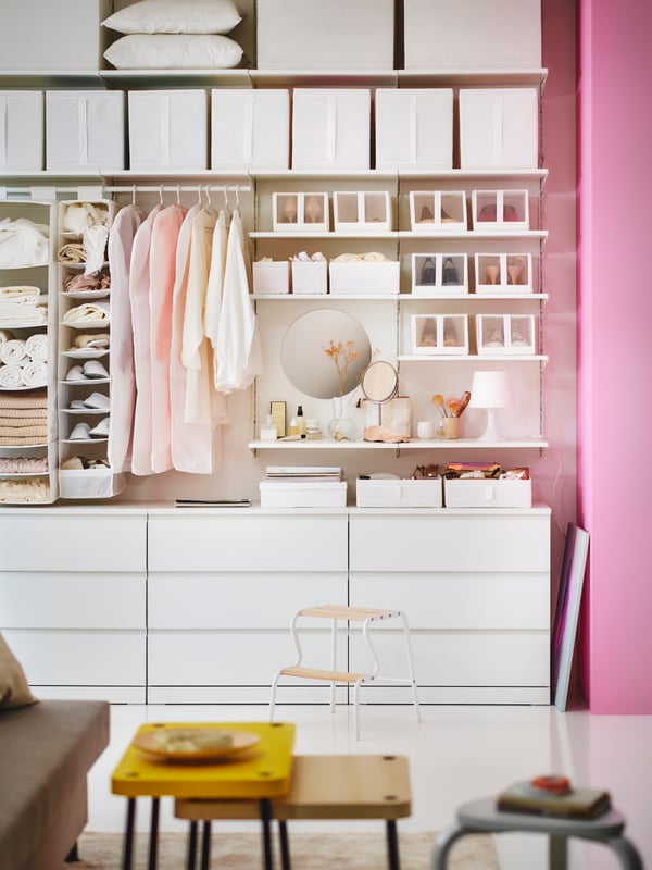 A white LAMPAN table lamp in the bedroom