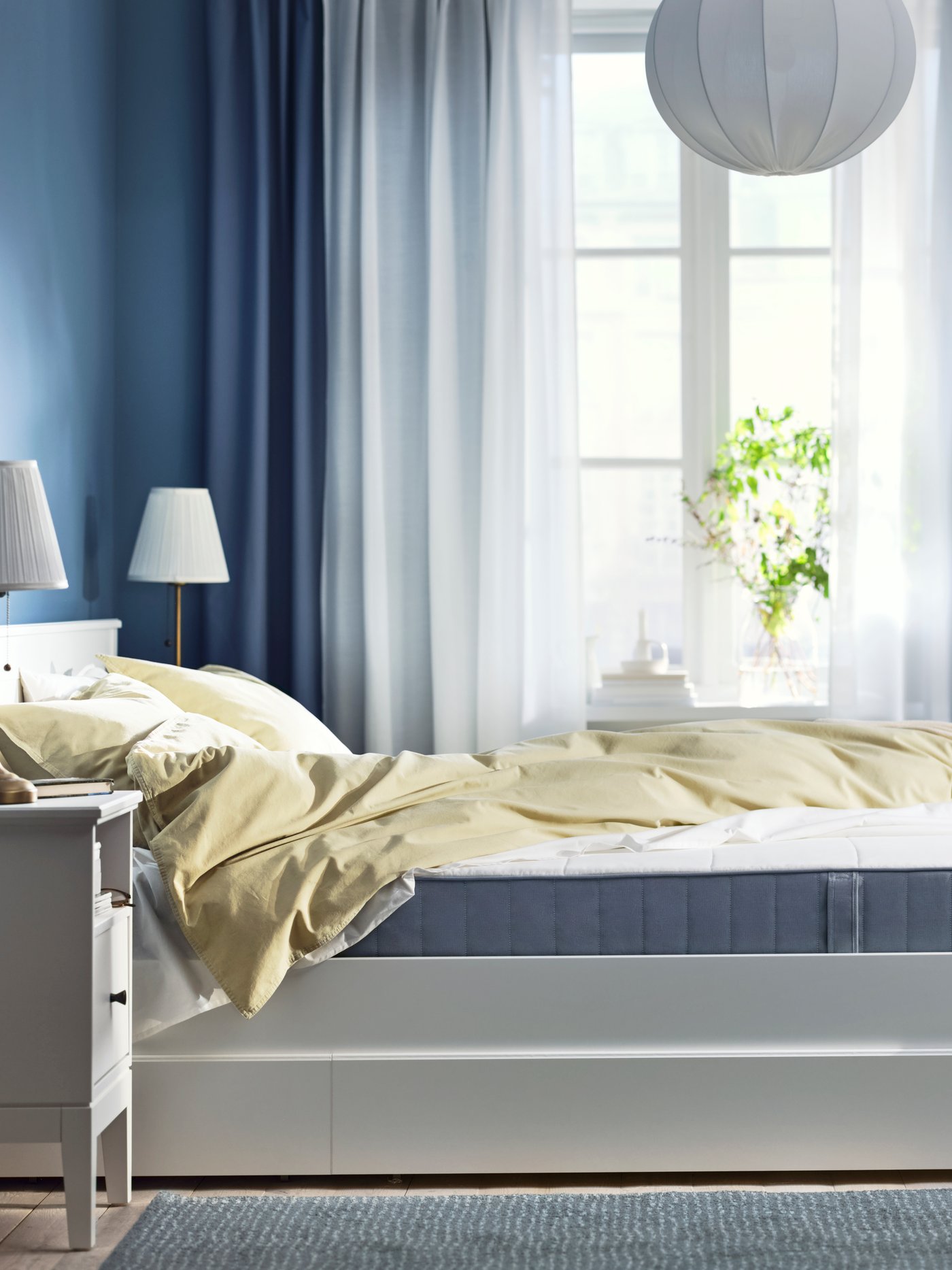 An extra firm/light blue VESTMARKA sprung mattress