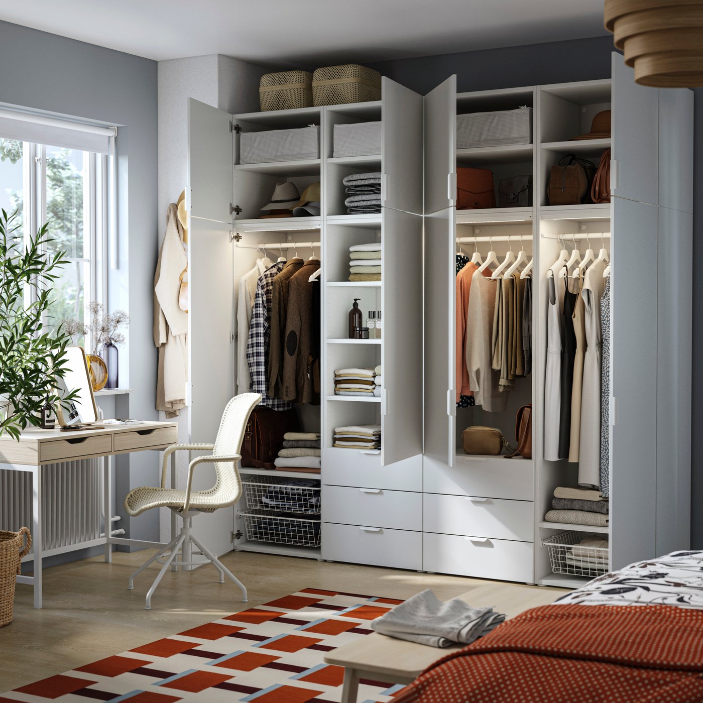 A white PLATSA wardrobe combination with 8 doors and 6 drawers