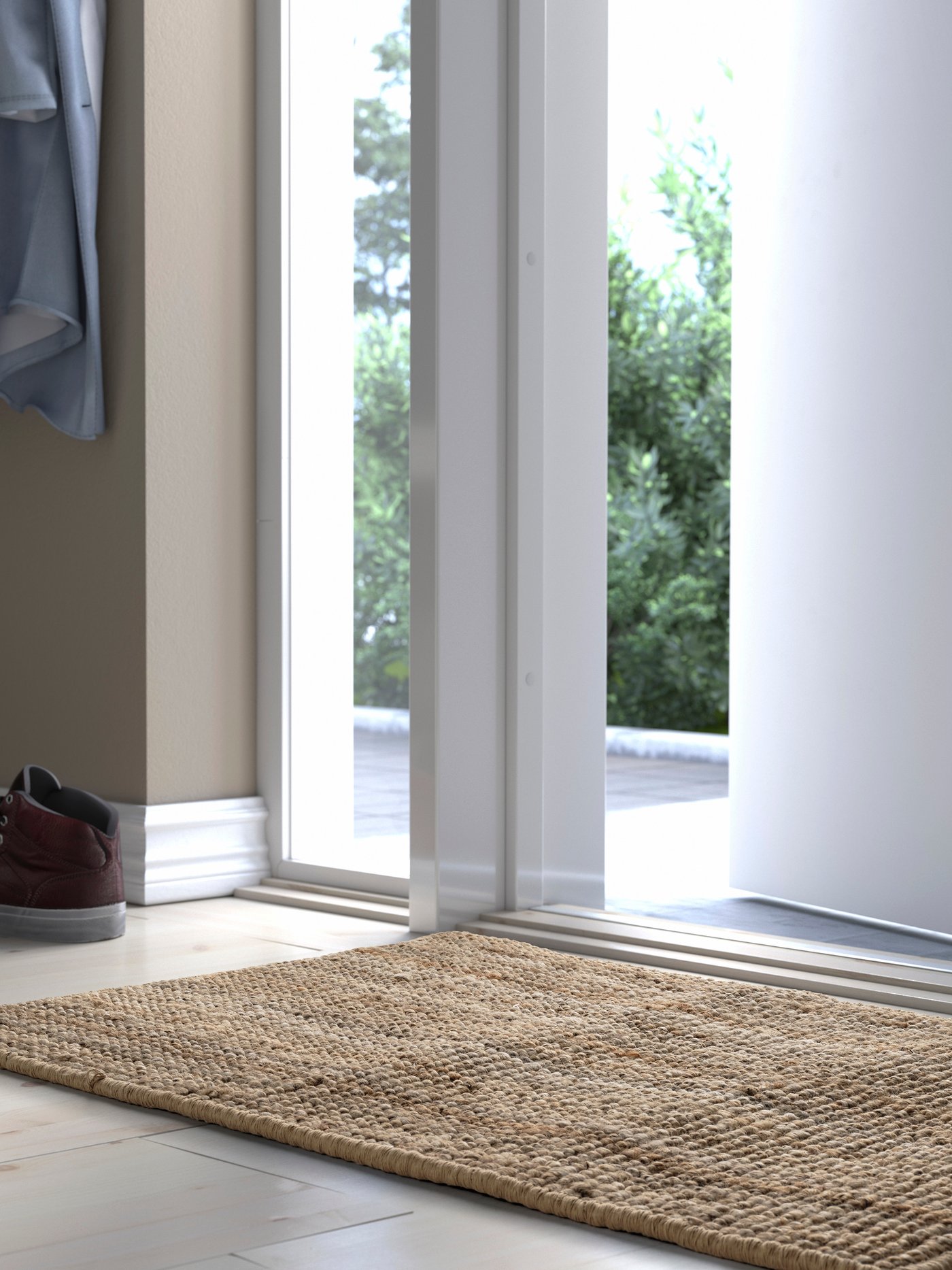 A natural LOHALS door mat, indoor