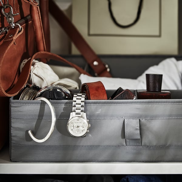 A dark grey SKUBB box with compartments