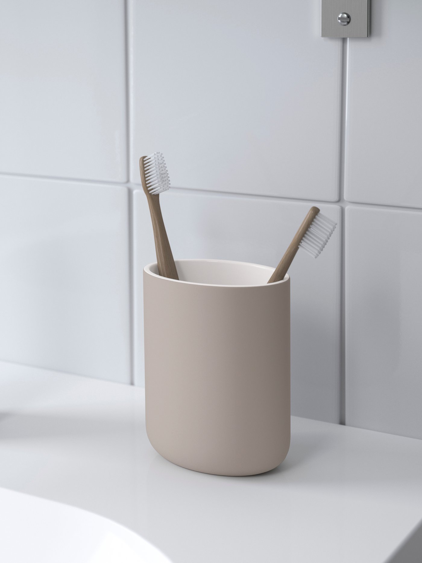 A beige EKOLN toothbrush holder