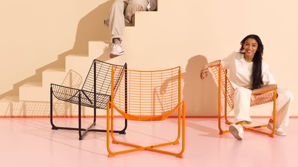 An orange SKÅLBODA armchair