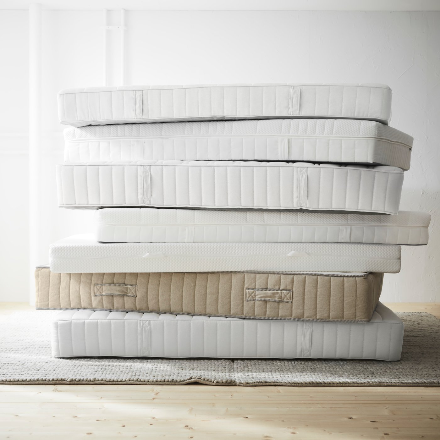 A firm/white ÅKREHAMN foam mattress