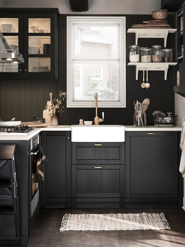 A black stained LERHYTTAN door in the kitchen