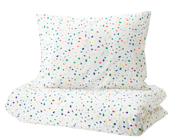 A white/mosaic patterned MÖJLIGHET duvet cover and pillowcase