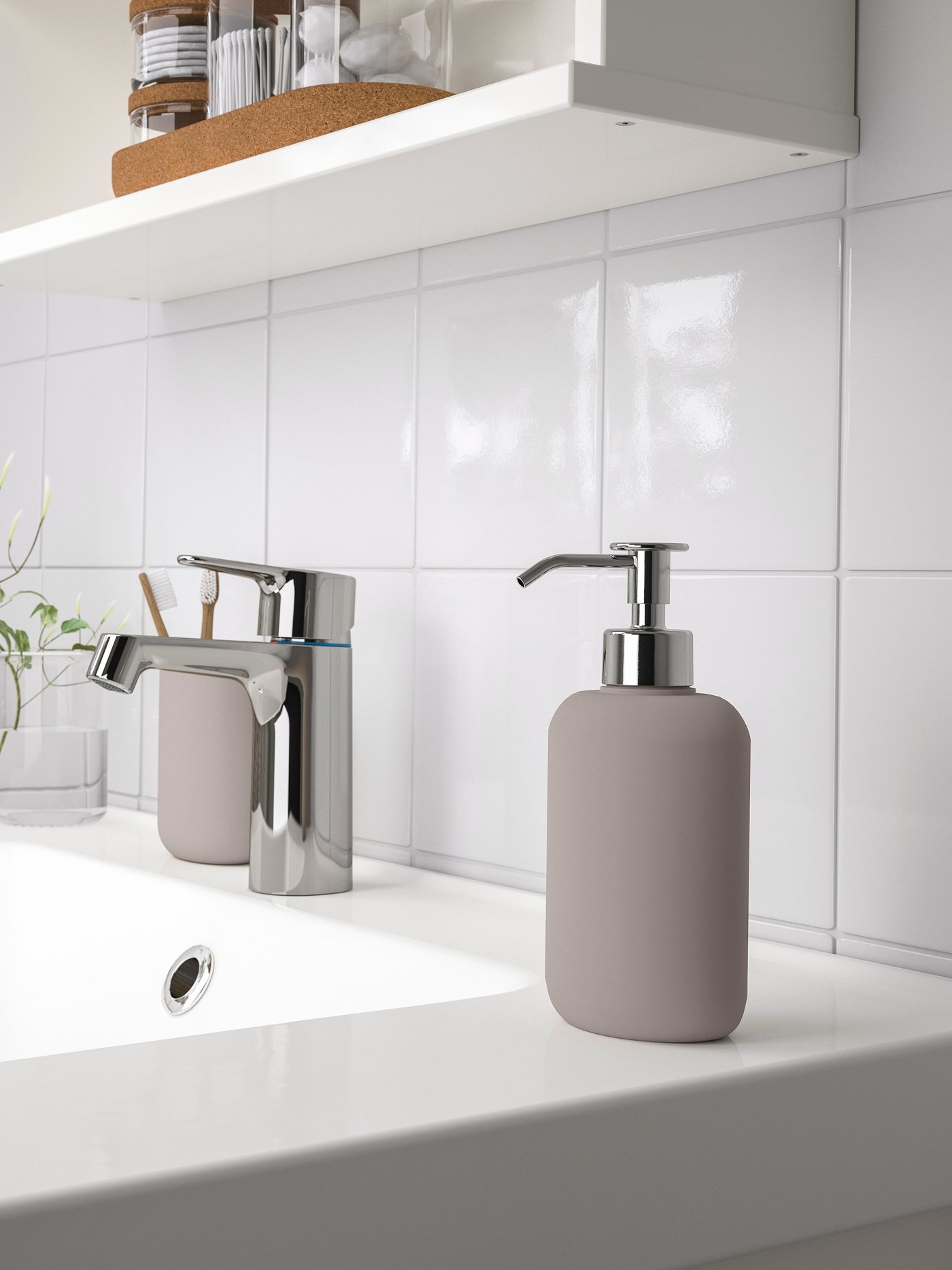 A beige EKOLN soap dispenser