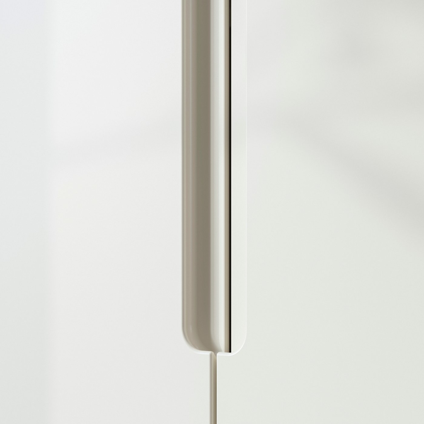 Close-up of PAX wardrobe in white with white handles.