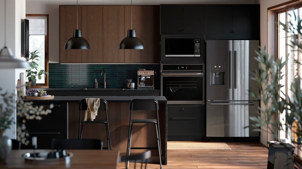 Brown SINARP kitchen with built in HJÄLTEBY oven, STÅNGBY microwave and STJÄRNSTATUS stainless steel fridge. 