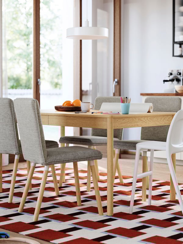 An oak veneer TONSTAD extendable table