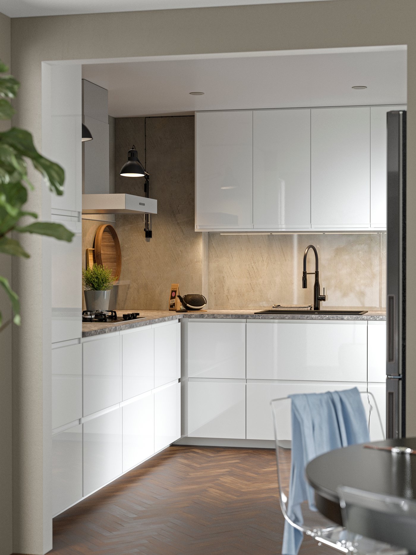 A high-gloss white VOXTORP door