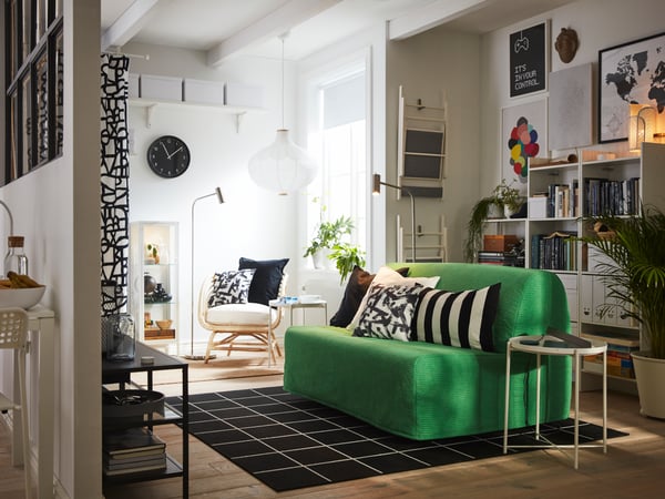Decorating a small room is not difficult with IKEA furniture. For example, this green LYCKSELE LÖVÅS sofa bed: a sofa by day, a bed by night.