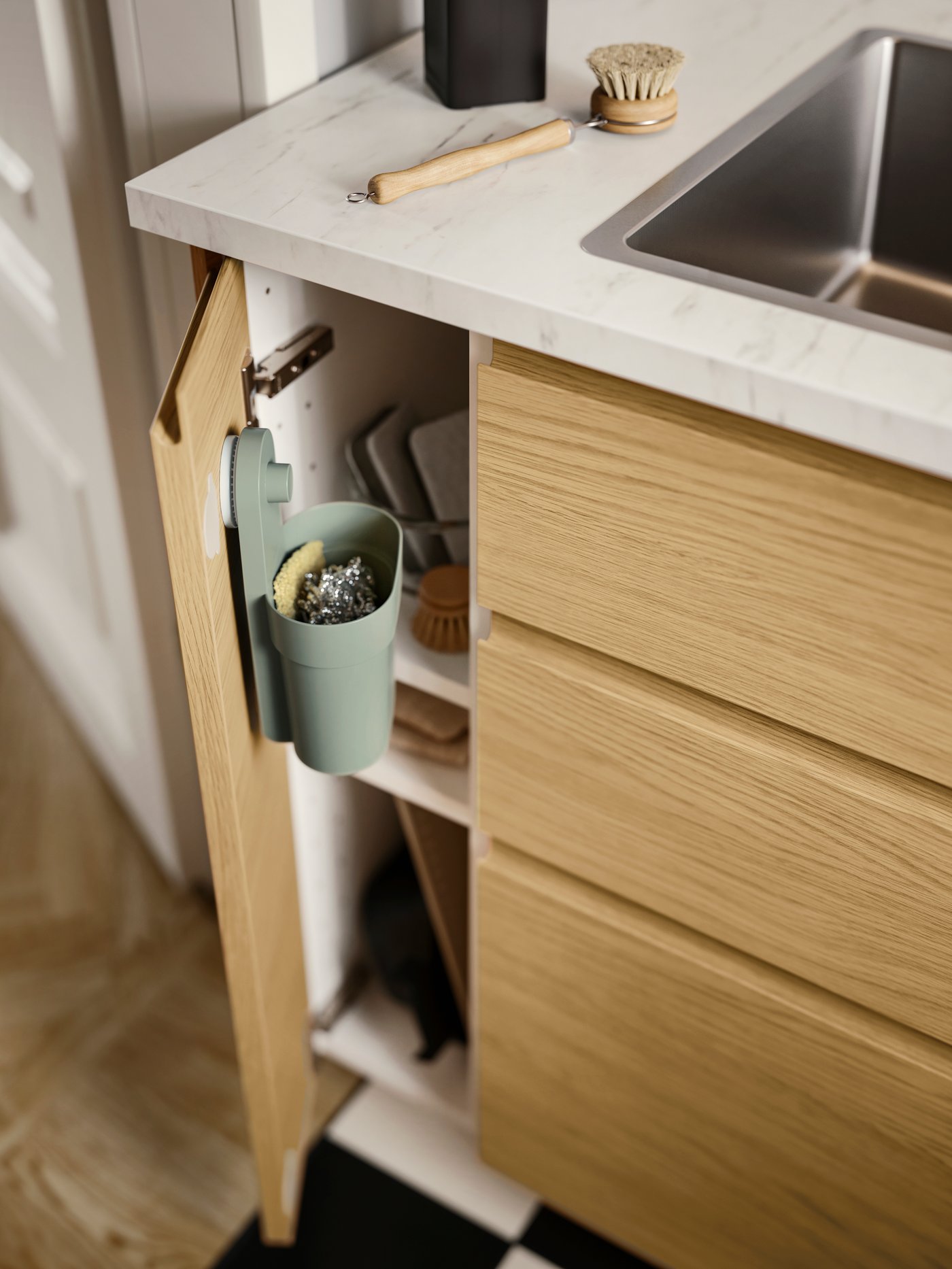 A grey RINNIG soap dispenser