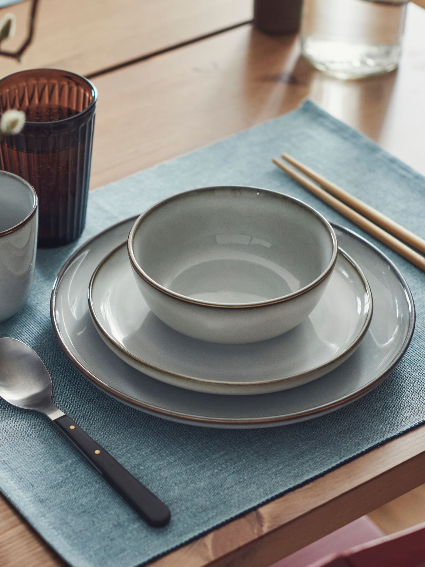 A grey GLADELIG side plate