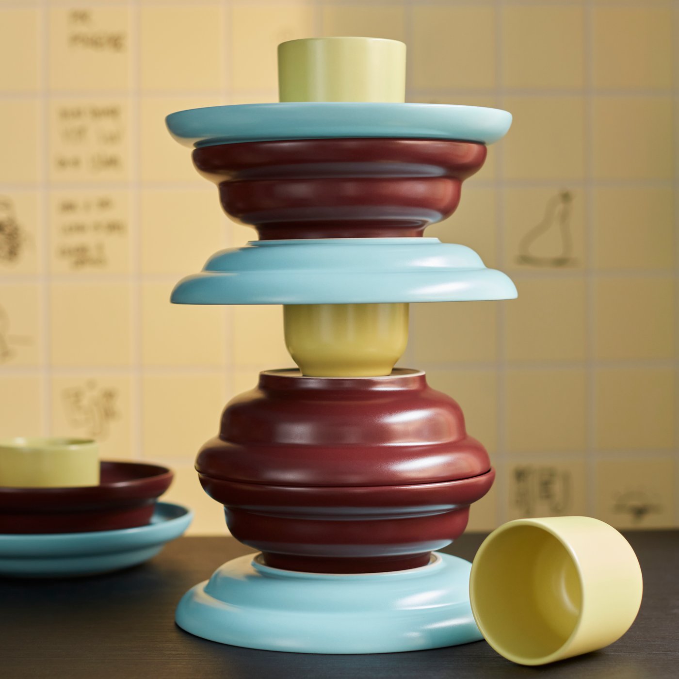 A mixed colours SPJUTLILJA 3-piece serving set in the dining room