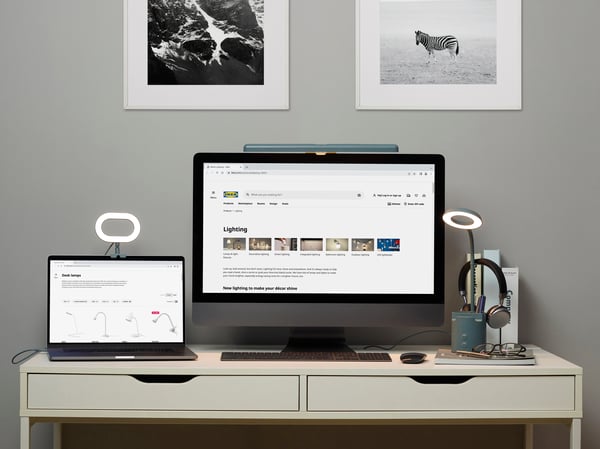 A dimmable/turquoise STÄNKREGN LED ring lamp