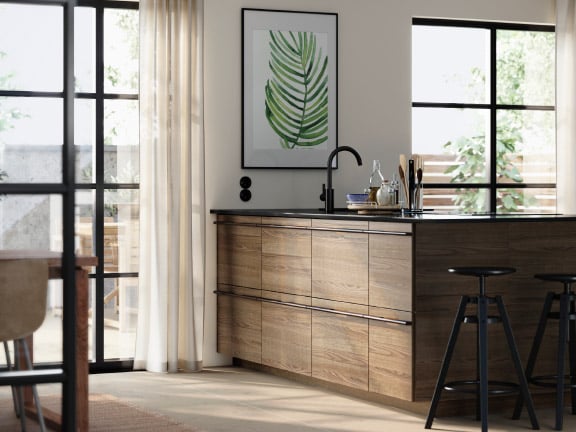 A dark brown ash veneer STENSTA drawer front