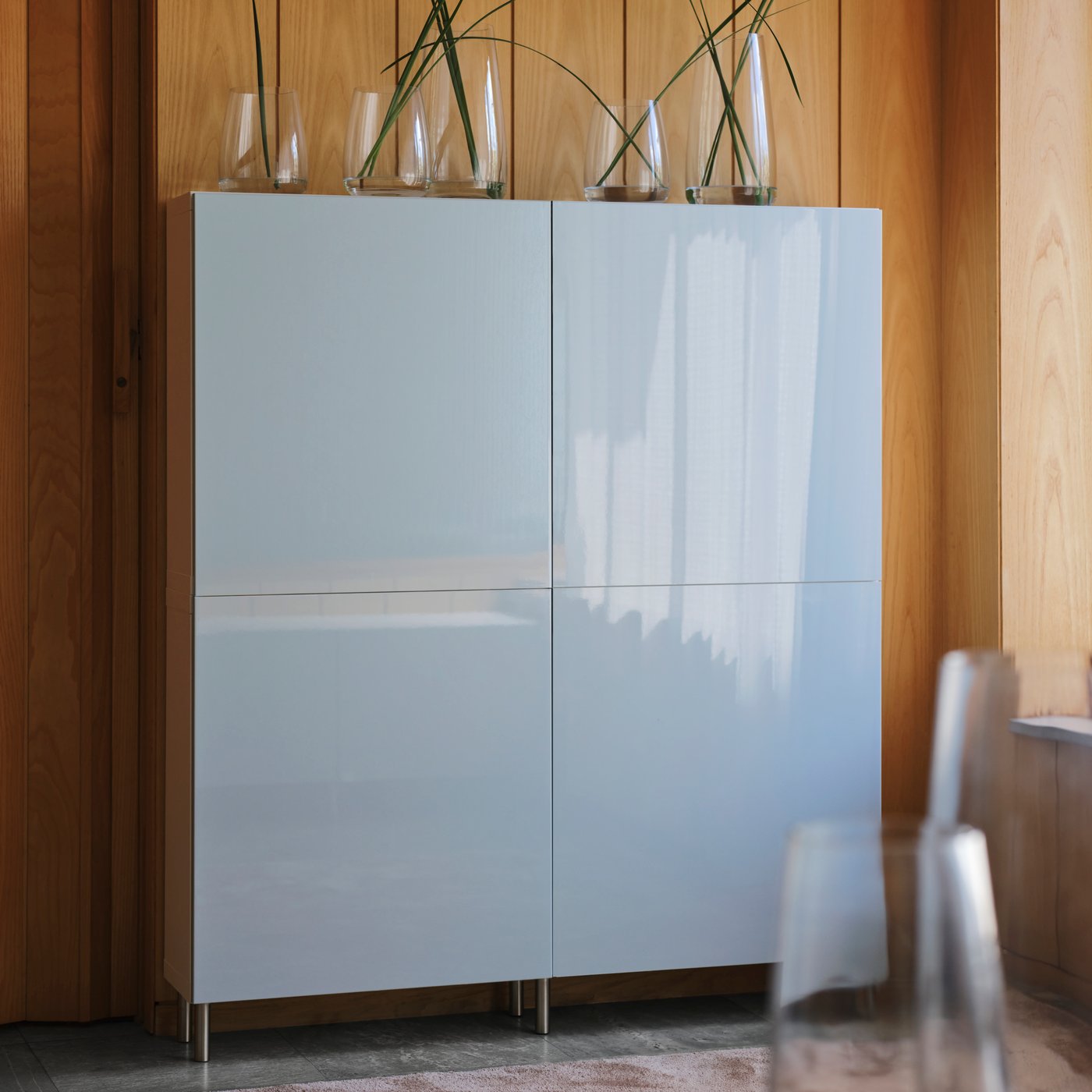 A high-gloss light grey-blue SELSVIKEN door
