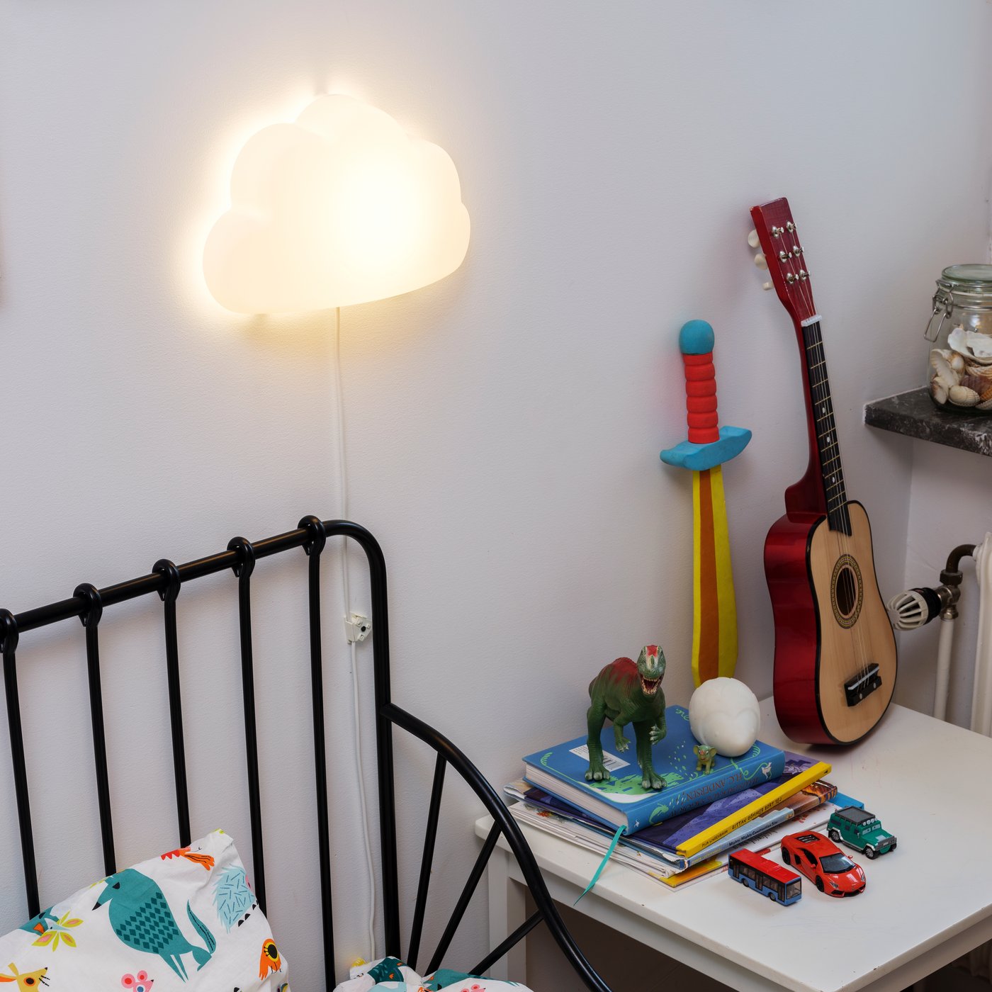 A clear glass KORKEN jar with lid