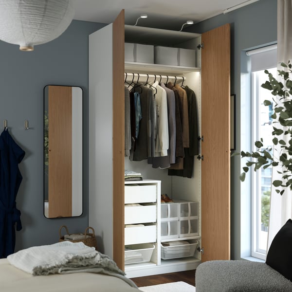 A white/oak effect PAX wardrobe combination