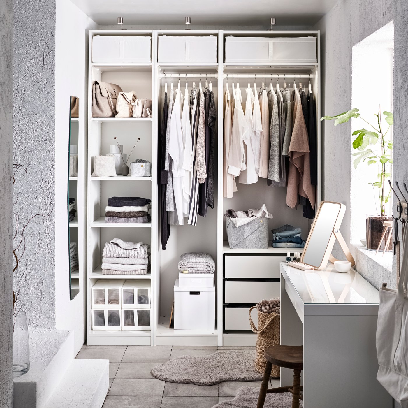 A white PAX wardrobe in the bedroom