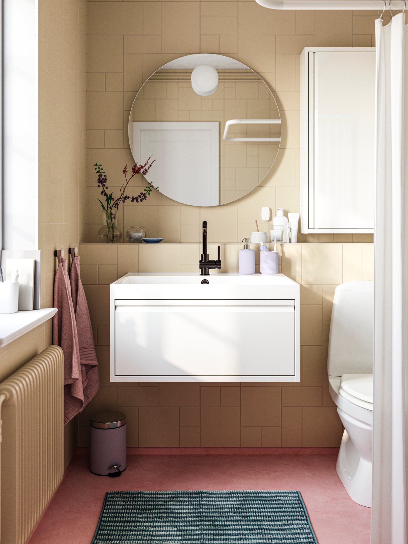 A white VIKARN shower curtain rod in the bathroom