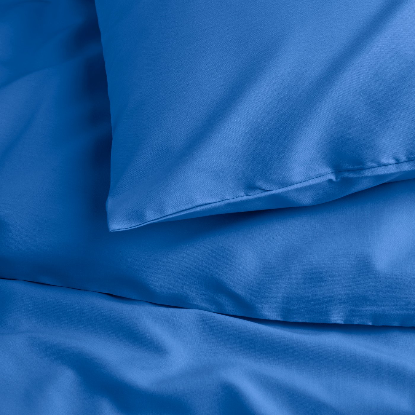 A blue PILTANDVINGE duvet cover and pillowcase in the NA