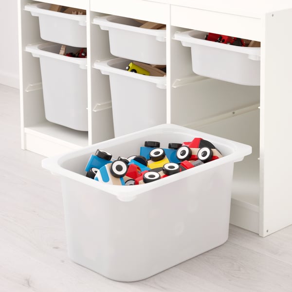 Meuble de rangement pour jouets TROFAST avec trains jouets dans une poubelle blanche