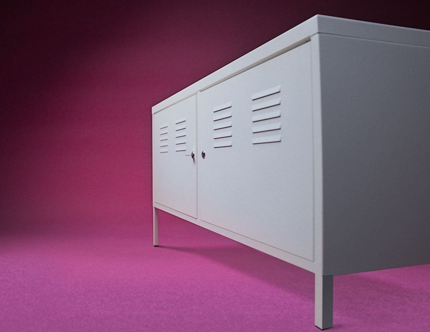 White metal storage unit on a purple background