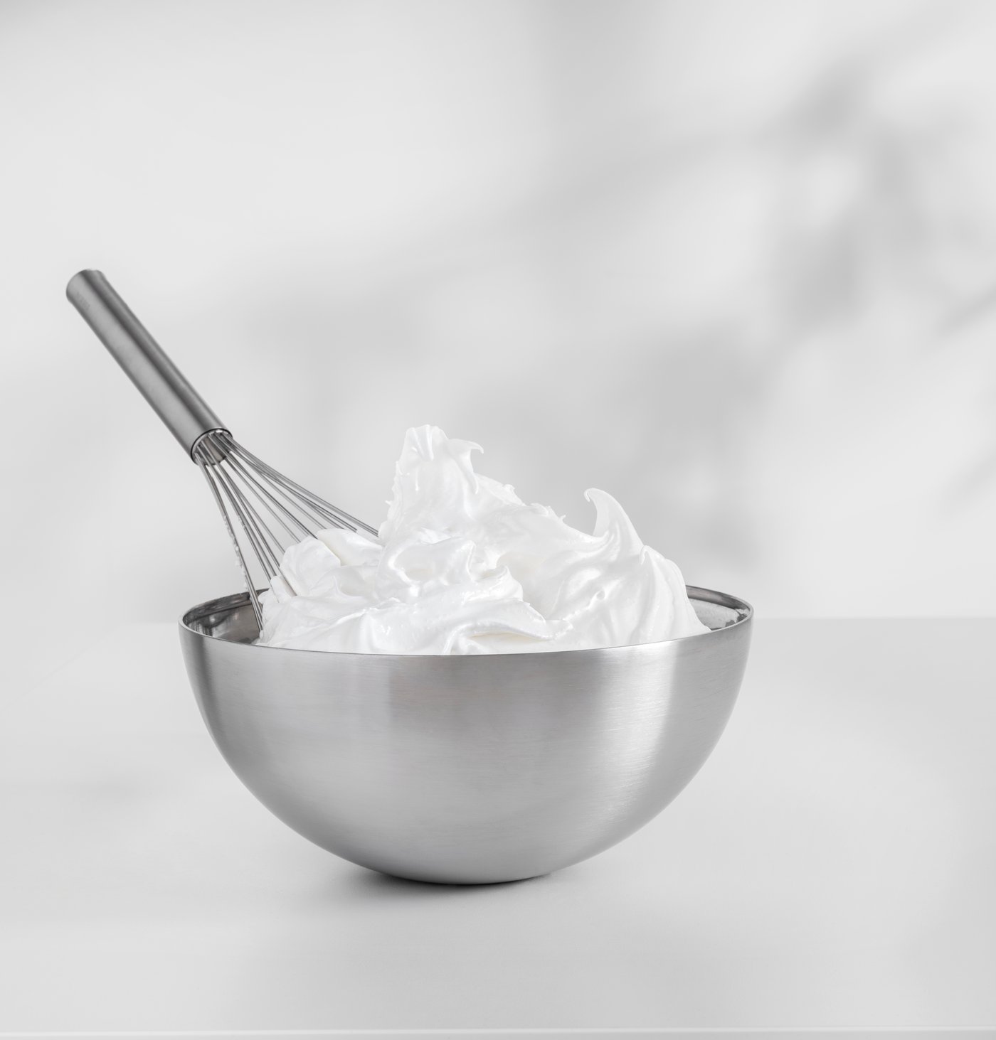 A stainless steel KONCIS balloon whisk in the kitchen