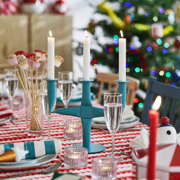 A table decorated playfully for Christmas.
