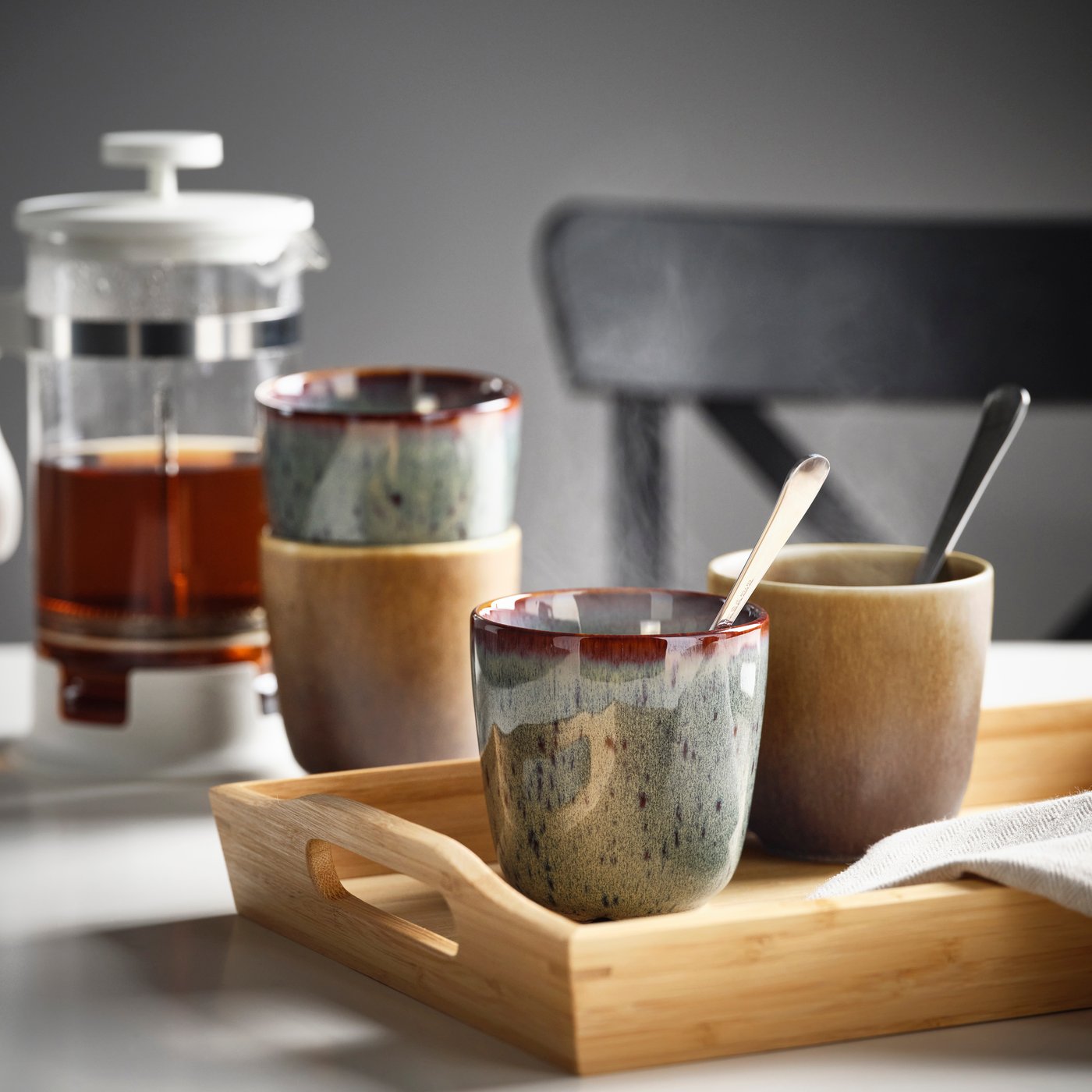 A mixed colours GLADELIG mug