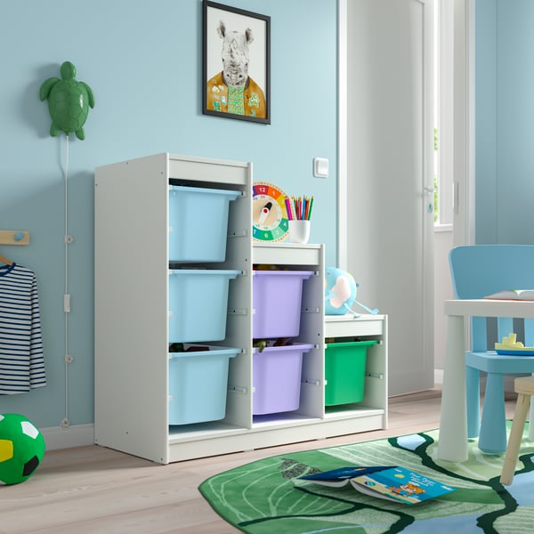 A bright green TROFAST storage box in the childrens room